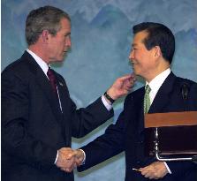 Bush reaffirms Kim's 'sunshine' policy